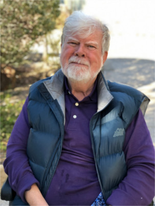 Michael poses for a portrait photo for his Mobile Integrated Health story.