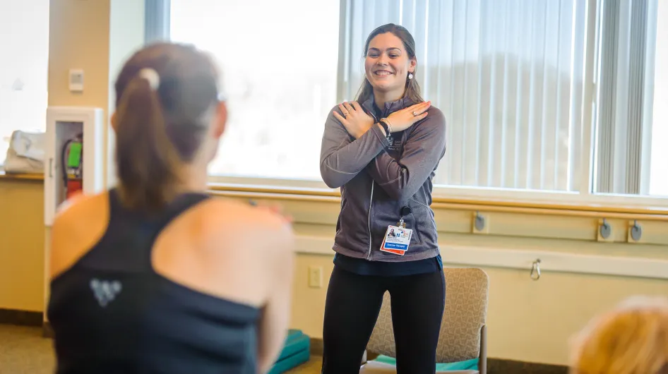 Community Exercise Instructor Doing Squat Thumbnail