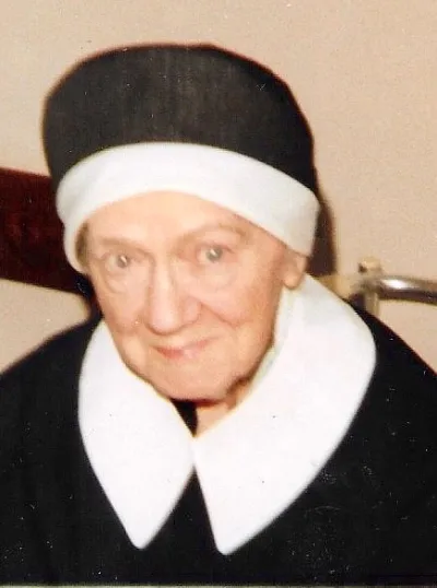 An elderly nun in a habit