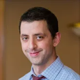 Headshot of Christopher Coughlin, CNP