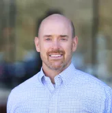 A professional headshot of Matthew Hjort, MD of South Shore Medical 