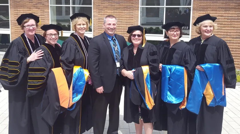 A group of South Shore Health Nurses graduate from Simmons College