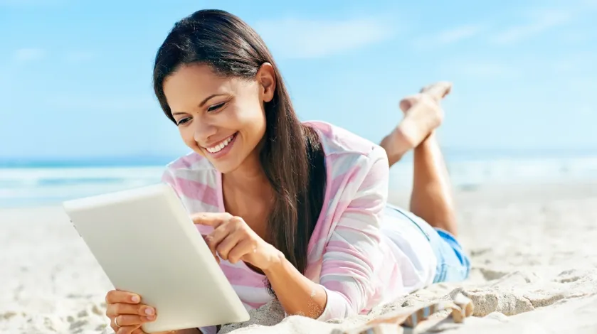 Woman on a tablet looking at South Shore MyChart