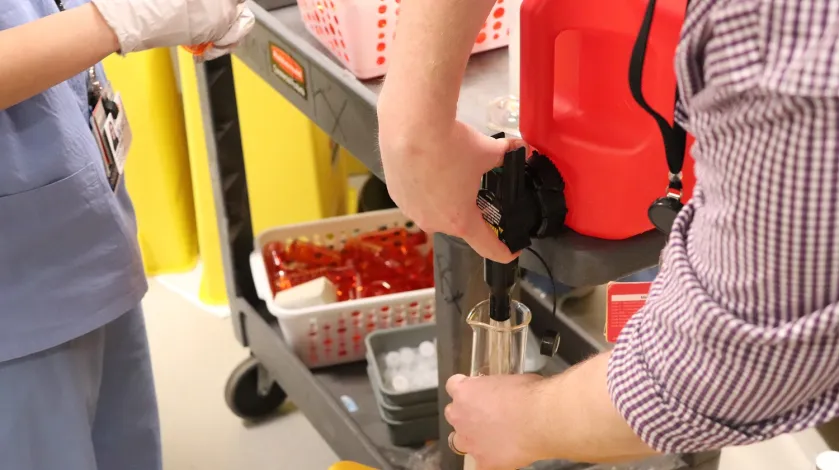 South Shore Health's pharmacy team works to make homemade hand sanitizer