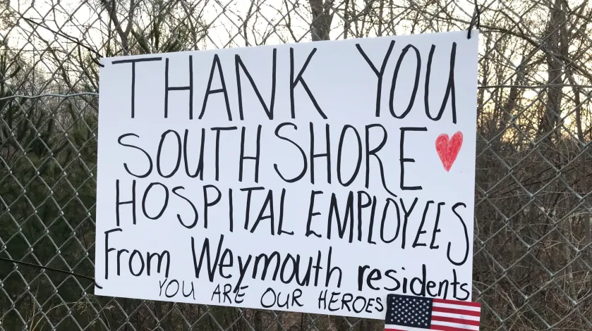 Photo of shuttle lot sign thanking South Shore Health employees