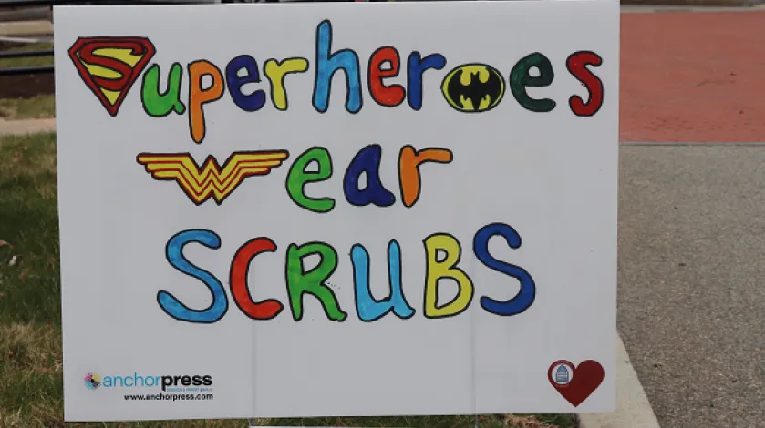 A homemade sign showing support for workers at South Shore Hospital