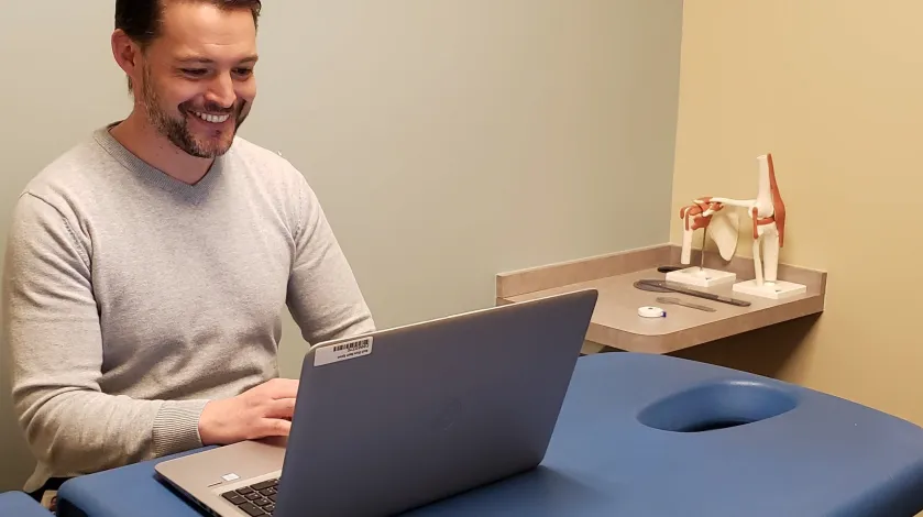 Tim Harrington, PT, conducts a virtual visit.