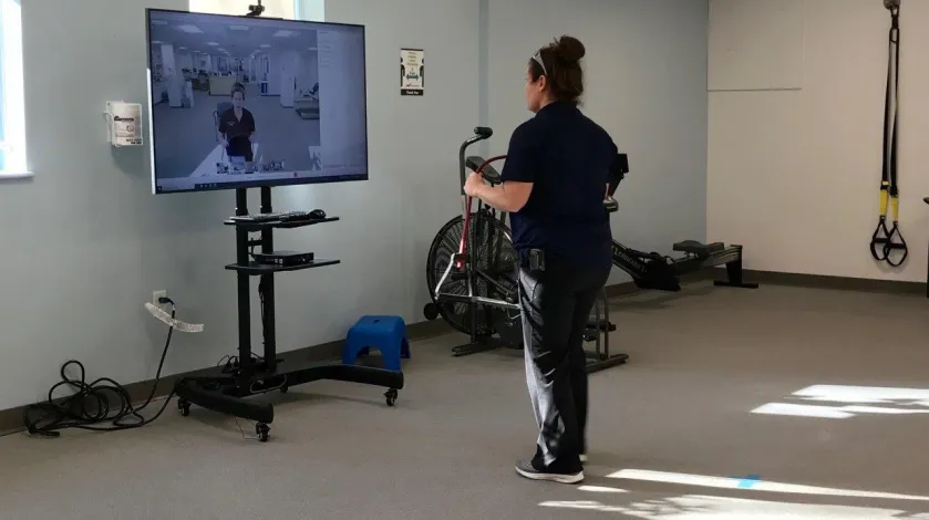 Jennifer Logan teaches a virtual exercise class