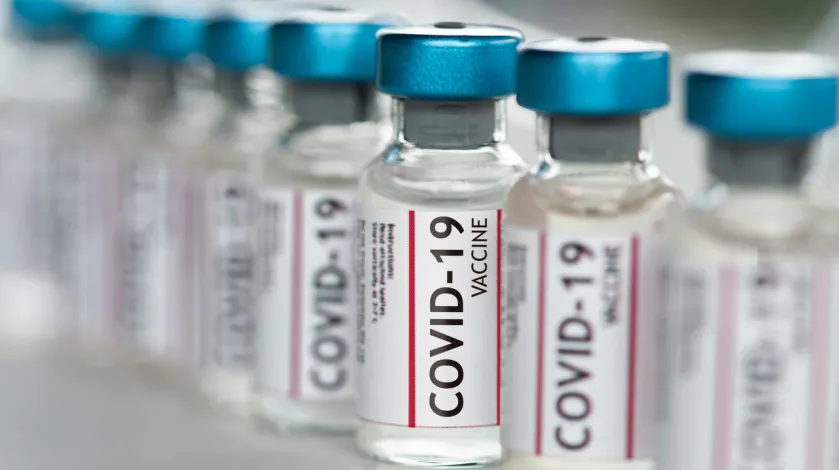 A photo of several vials of COVID-19 vaccine