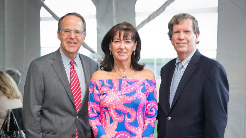 Chris Oddleifson, Rosemary Phalen, and Jim Phalen pose for a photo at South Shore Health's 2021 Luminaria event.