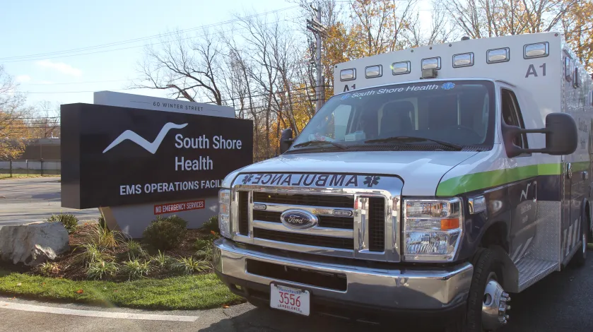 A close-up view of a South Shore Health ambulance parked at the new EMS Operations Facility in Weymouth.