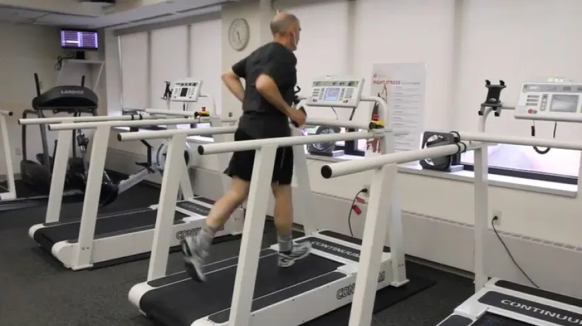 A man runs on a treadmill at South Shore Hospital's Cardiac Rehab Program.
