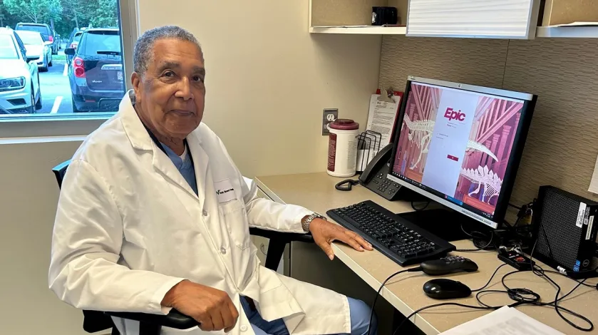 Dr. Arthur Bowman at his desk
