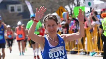 Photo of Anne Marie running the Boston Marathon