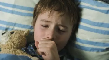 Child sick in bed