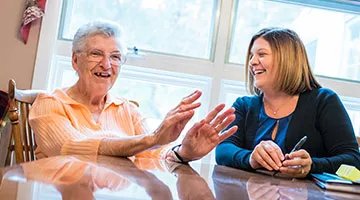 Two women sitting at a table
