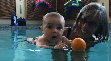 Baby enjoying Water Tots class
