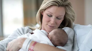 woman holding a baby
