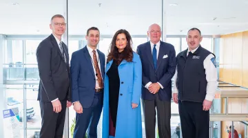 John and Eilene Grayken with South Shore Health caregivers at the gift announcement