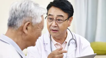 Doctor talking to patient