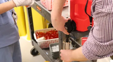 South Shore Health's pharmacy team works to make homemade hand sanitizer