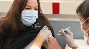 A South Shore Health colleague gets the COVID-19 vaccine