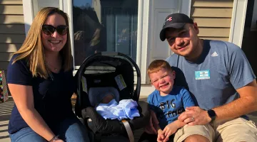 The Angelos Family poses for a family photo