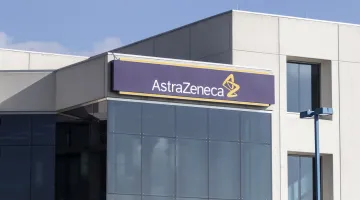 The AstraZeneca logo on the side of an office building
