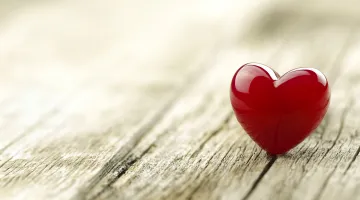 A heart on floor boards