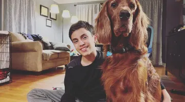 A boy and his Irish Setter 