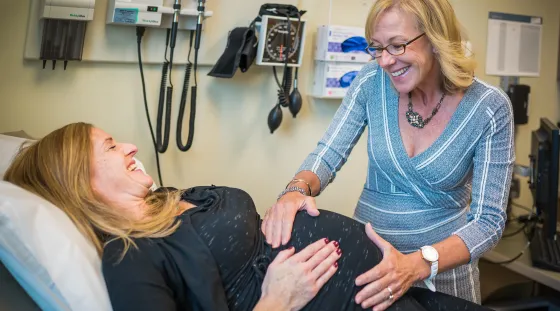 Pregnant woman being examined by her OBGYN